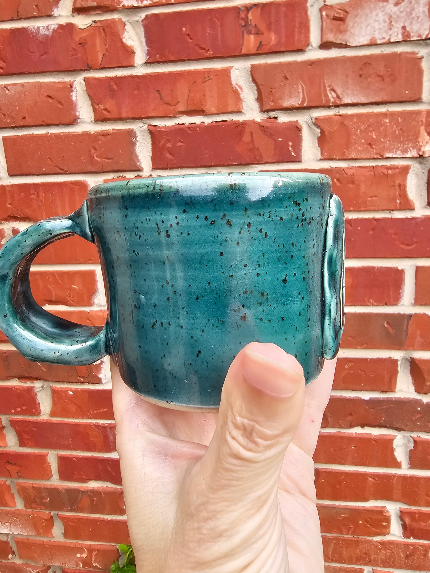 Rainforest Buddha Face Mug with Carved Handle
