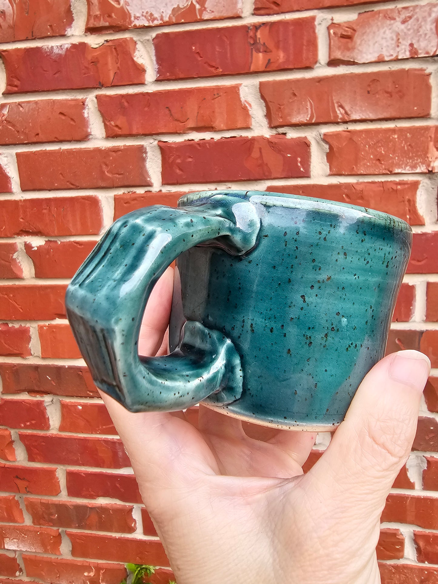 Rainforest Buddha Face Mug with Carved Handle