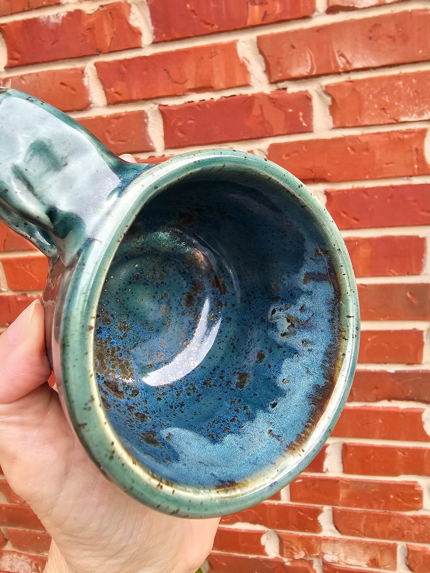 Rainforest Buddha Face Mug with Carved Handle