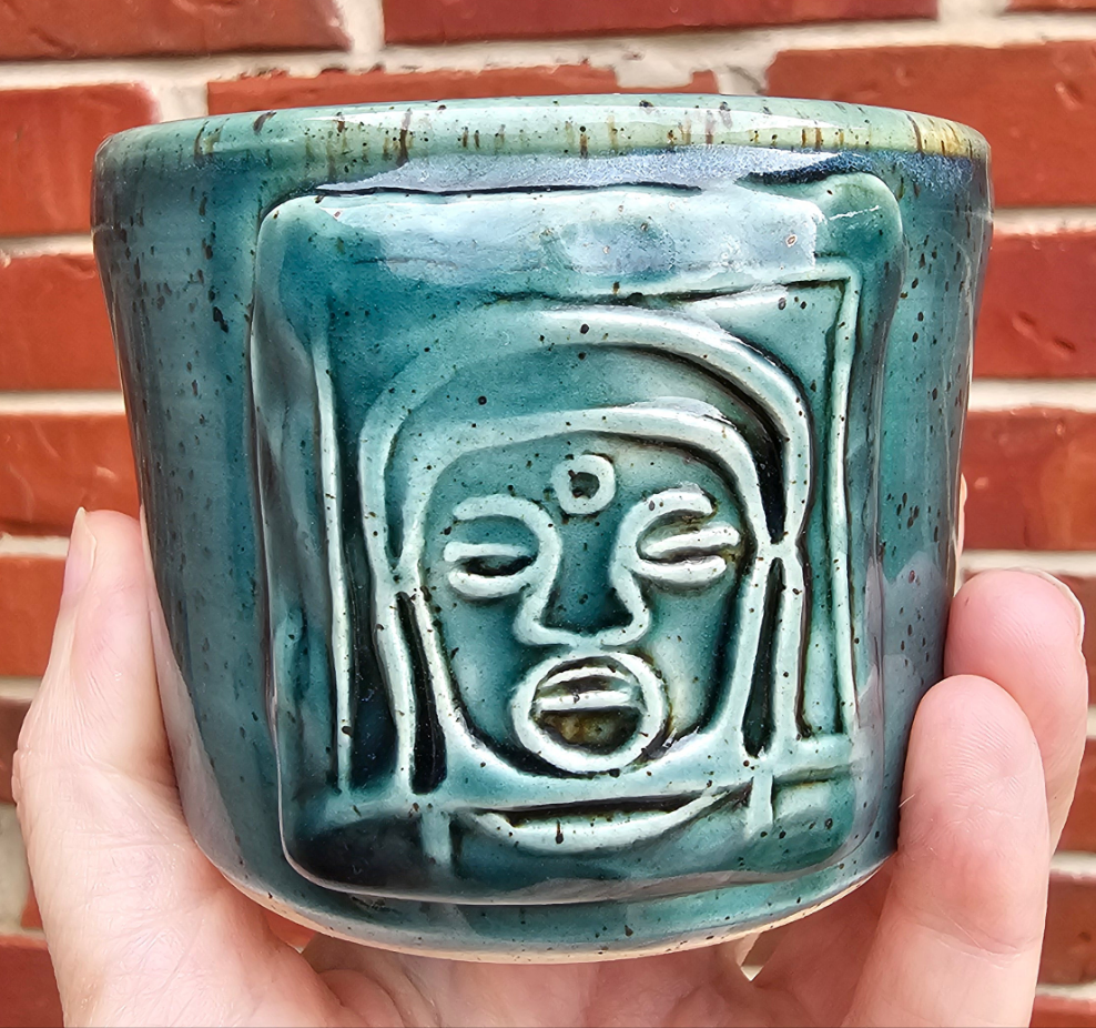Rainforest Buddha Face Mug with Carved Handle
