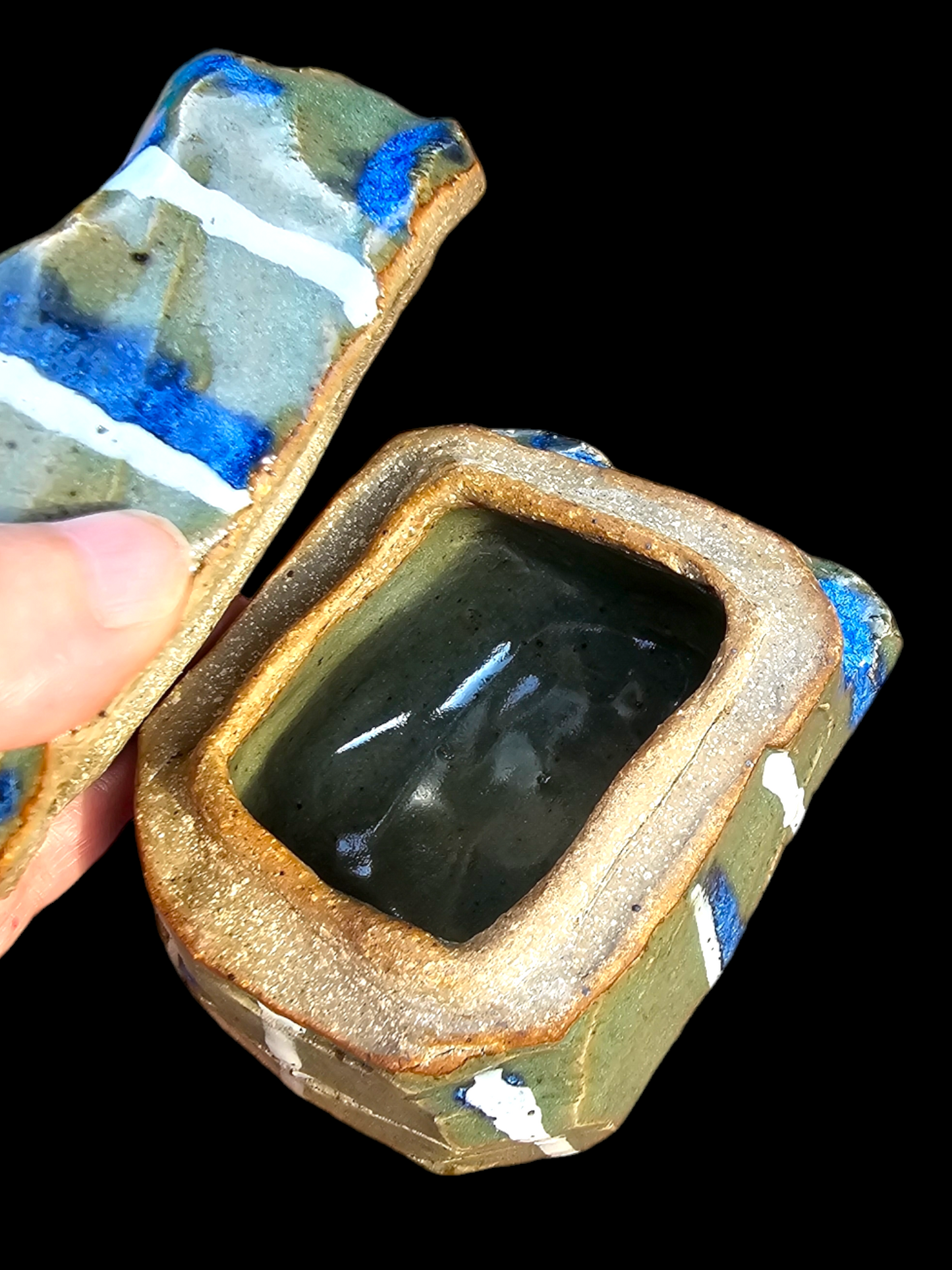 "Melting snow, flowing rivers" a Kurinuki style carved Ceramic lidded Box