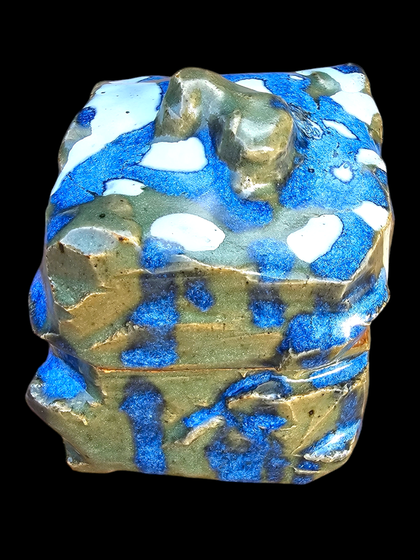 "Melting snow, flowing rivers" a Kurinuki style carved Ceramic lidded Box